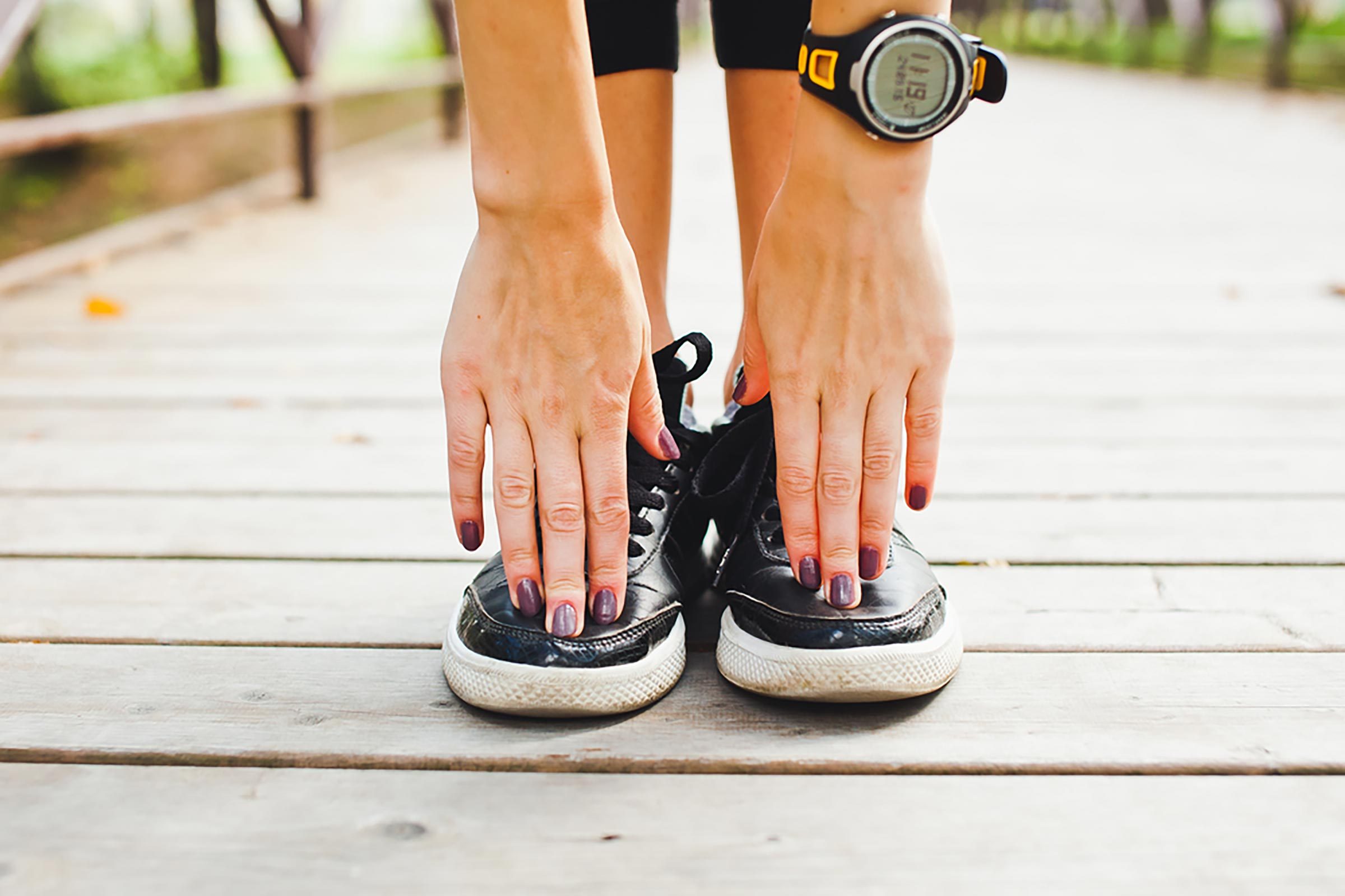 woman touching toes