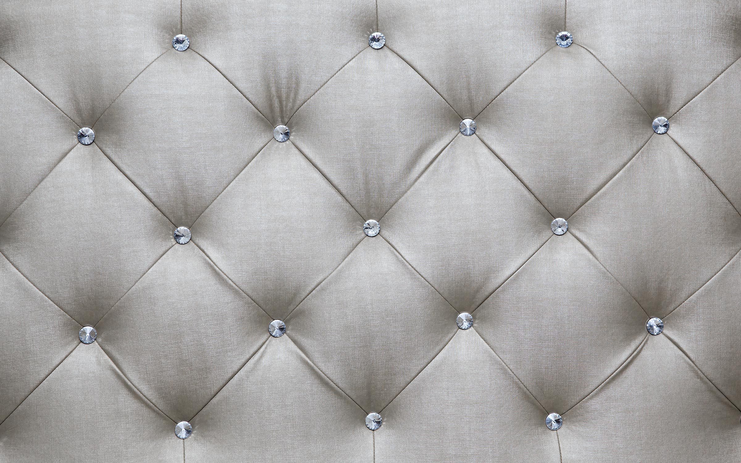 White couch cushions, background patterns.
