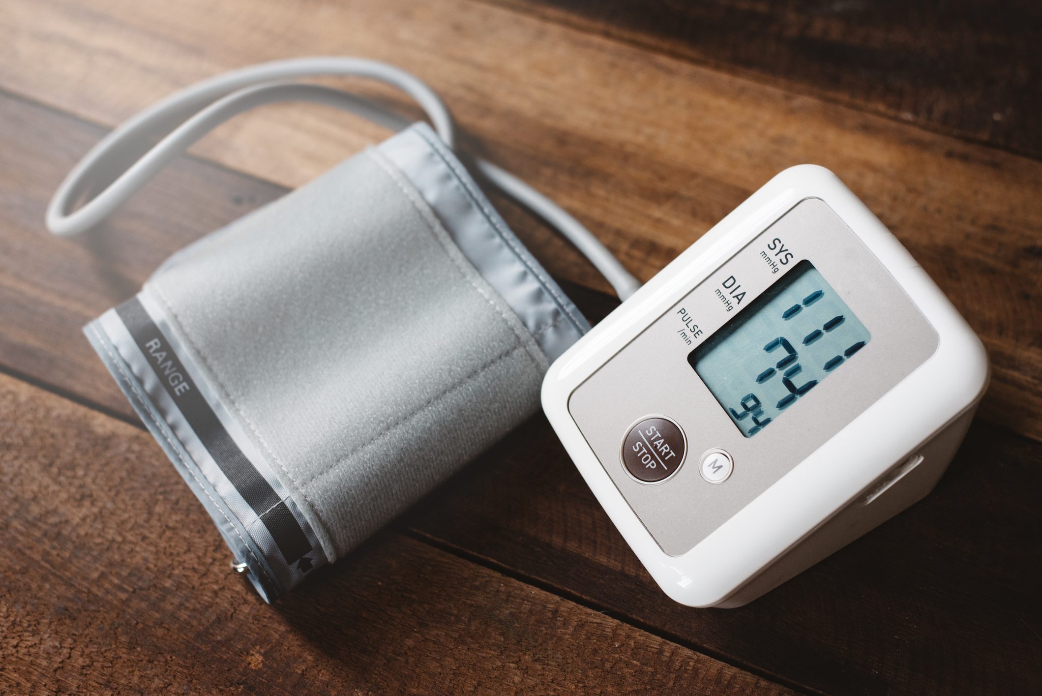 blood pressure machine on wood table