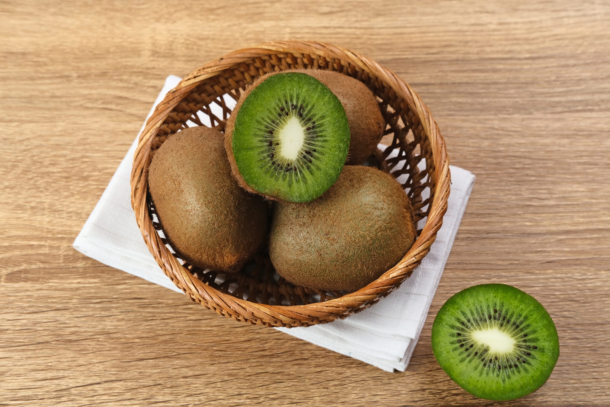 Fresh kiwi fruits, selected focus image, close up.